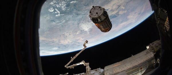 This photo provided by NASA TV shows a Japanese cargo ship before it arrives with Christmas gifts to the International Space Station on Tuesday, Dec. 13, 2016 - Sputnik International