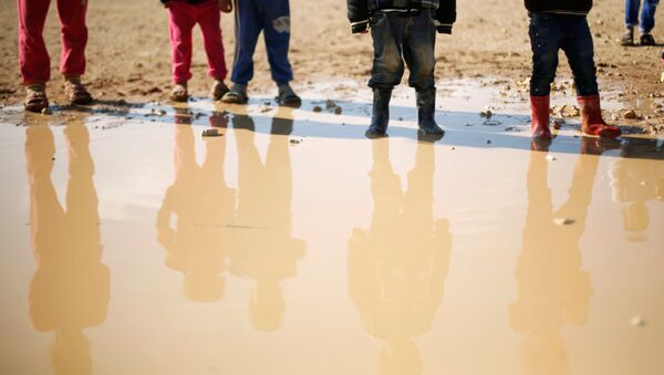 Syrian refugee children play at Al Zaatari refugee camp in Jordan - Sputnik International