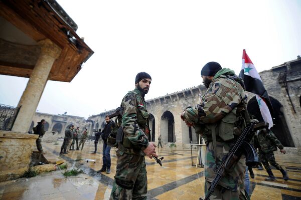 Forces loyal to Syria's President Bashar al-Assad stand inside the Umayyad mosque, in the government-controlled area of Aleppo, during a media tour, Syria December 13, 2016 - Sputnik International