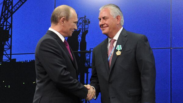 Vladimir Putin and Rex Tillerson - Sputnik International