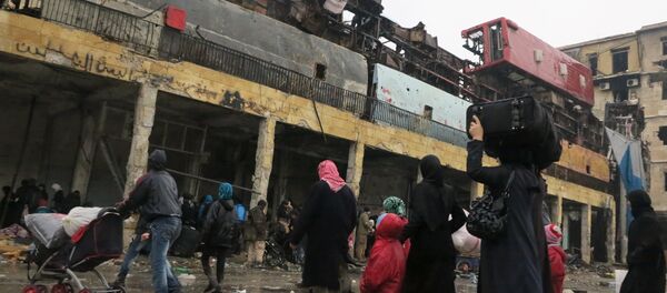 Refugees in the liberated district of eastern Aleppo Refugees in the liberated district of eastern Aleppo - Sputnik International