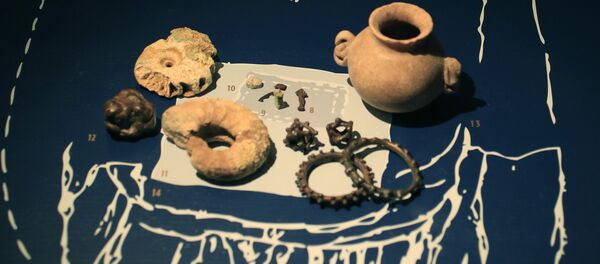 A grave inventory of a Late-Scythian elite woman from the first century A.D., is displayed as part of the exhibit called The Crimea - Gold and Secrets of the Black Sea, at Allard Pierson historical museum in Amsterdam Friday - Sputnik International