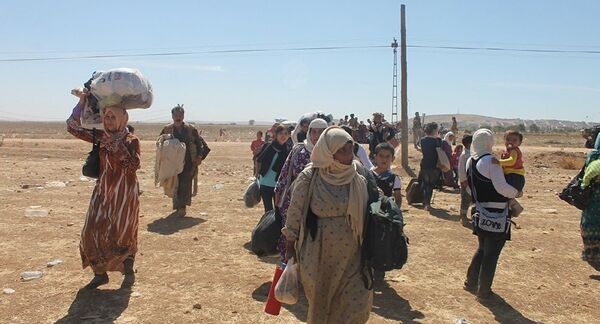 Rescued residents of the Al-Raqqah Province Rescued residents of the Al-Raqqah Province - Sputnik International