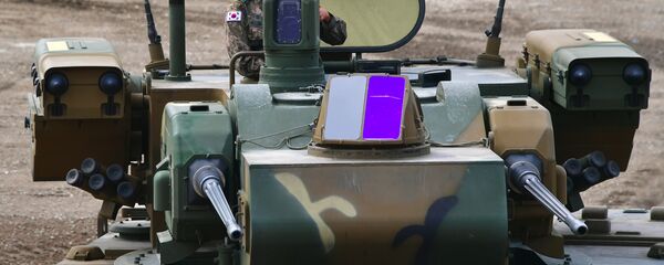 A South Korean soldier sits on the top of a K30 Biho, twin 30mm self-propelled anti-aircraft gun A South Korean soldier sits on the top of a K30 Biho, twin 30mm self-propelled anti-aircraft gun - Sputnik International