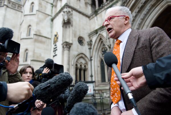 Phil Shiner of Public Interest Lawyers outlines his case against the Ministry of Defence to members of the media as he stands outside the High Court in central London on January 29, 2013.  - Sputnik International