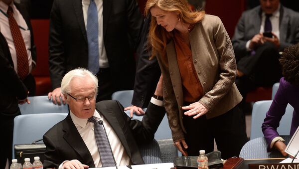 US Ambassador to the UN Samantha Power talks with her Russian counterpart Vitaly Churkin prior to a vote on a resolution on Ukraine during a UN Security Council emergency meeting at United Nations headquarters in New York. (File) - Sputnik International
