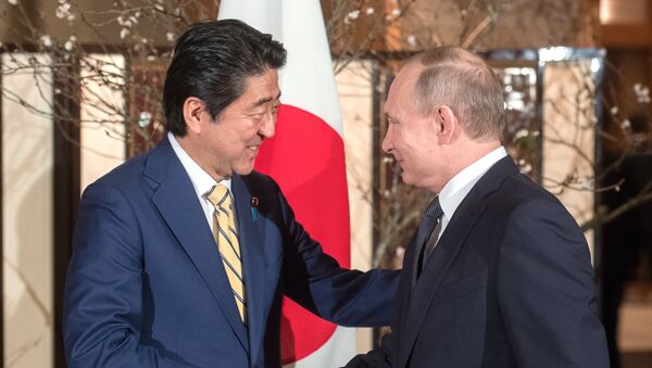 December 15, 2016. Russian President Vladimir Putin and Japanese Prime Minister Shinzo Abe, left, meet in Nagato, Yamaguchi Prefecture. - Sputnik International