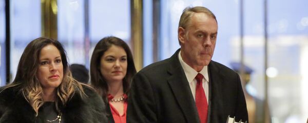 Rep. Ryan Zinke, right, R-Mont., arrives in Trump Tower, in New York Rep. Ryan Zinke, right, R-Mont., arrives in Trump Tower, in New York - Sputnik International