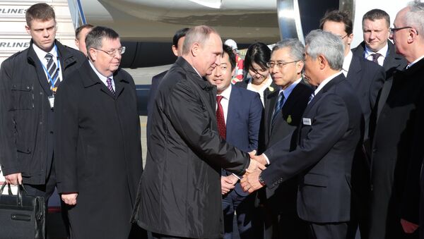Russian President Vladimir Putin arrives in Tokyo - Sputnik International