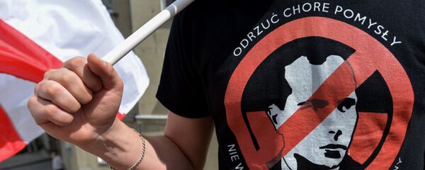 A participant in a march in memory of the Volhynia massacre victims, in Przemysl. - Sputnik International