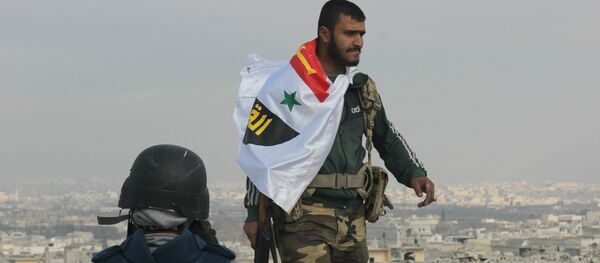 Picture of Syrian Arab Army soldier on rooftop of Sheikh Saeed in Eastern Aleppo the morning after full liberation from Nusra Front led militant factions. Picture of Syrian Arab Army soldier on rooftop of Sheikh Saeed in Eastern Aleppo the morning after full liberation from Nusra Front led militant factions. - Sputnik International