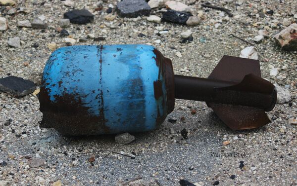 Unexploded gas canister fired by Nusra Front and associated NATO and Gulf state funded militant factions, Old City, East Aleppo - Sputnik International