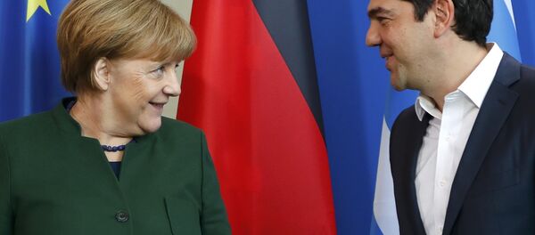 German Chancellor Angela Merkel and Greek Prime Minister Alexis Tsipras (R) leave after a statement at the chancellery in Berlin, Germany, December 16, 2016. - Sputnik International