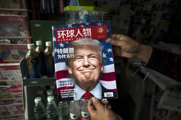 Copy of the local Chinese magazine Global People with a cover story that translates to Why did Trump win at a news stand in Shanghai. (File) Copy of the local Chinese magazine Global People with a cover story that translates to Why did Trump win at a news stand in Shanghai. (File) - Sputnik International