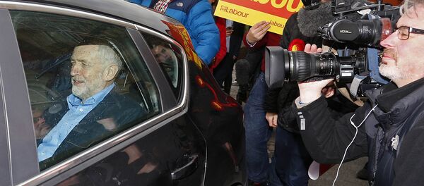 British opposition Labour Party leader Jeremy Corbyn (L) leaves in a car after speaking to the media following Labour candidate Jim McMahon's victory in the by-election for Oldham West and Royton outside Chadderton Town Hall in Chadderton, Oldham, northwest England, on December 4, 2015. British opposition Labour Party leader Jeremy Corbyn (L) leaves in a car after speaking to the media following Labour candidate Jim McMahon's victory in the by-election for Oldham West and Royton outside Chadderton Town Hall in Chadderton, Oldham, northwest England, on December 4, 2015. - Sputnik International