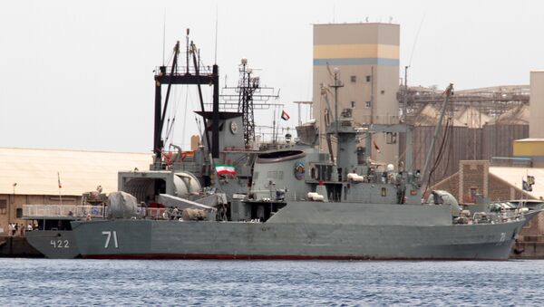 Iranian military ships frigate Alvand (R) and light replenishment ship Bushehr - Sputnik International
