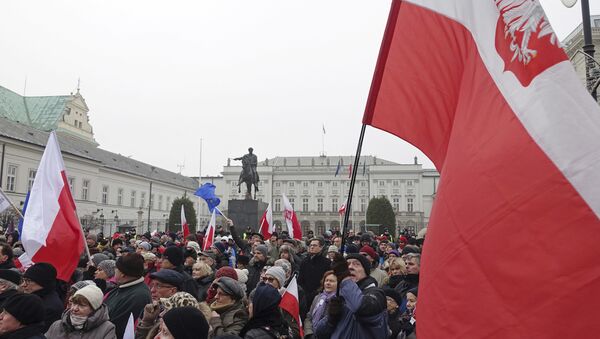 Protesters attend an anti-government demonstration, in Warsaw, Poland - Sputnik International