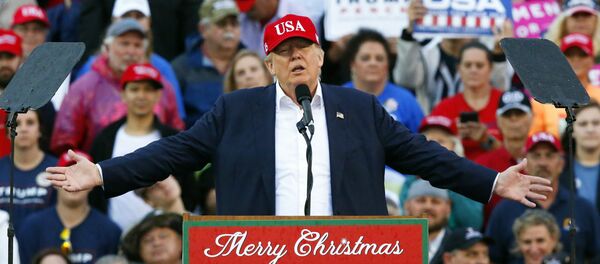 President-elect Donald Trump speaks during a rally at the Ladd–Peebles Stadium, Saturday, Dec. 17, 2016, in Mobile, Ala. President-elect Donald Trump speaks during a rally at the Ladd–Peebles Stadium, Saturday, Dec. 17, 2016, in Mobile, Ala. - Sputnik International