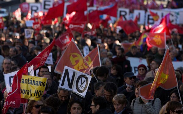 People march during a protest called by the main union against the government's austerity and social measures in Madrid, Spain December 18, 2016 People march during a protest called by the main union against the government's austerity and social measures in Madrid, Spain December 18, 2016 - Sputnik International