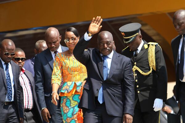 Congolese President Joseph Kabila, center, waves as he and others celebrate the Democratic Republic of Congo, DRC, independence in Kindu, Congo, Thursday, June 30, 2016. Congo's president says nothing can stop long-awaited elections from taking place even as fears mount of a possible delay. Congolese President Joseph Kabila, center, waves as he and others celebrate the Democratic Republic of Congo, DRC, independence in Kindu, Congo, Thursday, June 30, 2016. Congo's president says nothing can stop long-awaited elections from taking place even as fears mount of a possible delay. - Sputnik International