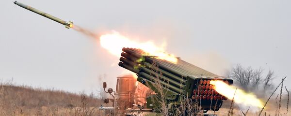 Ukrainian 122 mm MLRS BM-21 Grad fires rocket during a military exercise at a shooting range close to Devichiki in the Kiev region on October 28, 2016 - Sputnik International