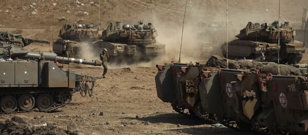 Israeli soldiers manuever tanks and armoured personnel carriers (File) Israeli soldiers manuever tanks and armoured personnel carriers (File) - Sputnik International