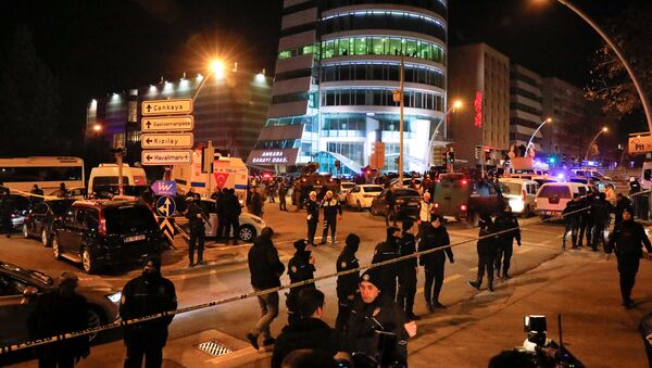 Turkish police secure the area near an art gallery where the Russian Ambassador to Turkey Andrei Karlov was shot in Ankara, Turkey, December 19, 2016 - Sputnik International