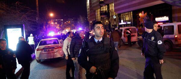 Turkish police secure the area near an art gallery where the Russian Ambassador to Turkey Andrei Karlov was shot, in Ankara, Turkey, December 19, 2016 - Sputnik International
