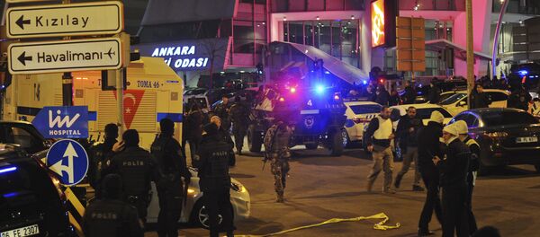 Turkish police officers cordon off the area close to a photo gallery where the Russian Ambassador to Turkey, Andrei Karlov, was shot and killed by a gunman in Ankara, Turkey. Turkish police officers cordon off the area close to a photo gallery where the Russian Ambassador to Turkey, Andrei Karlov, was shot and killed by a gunman in Ankara, Turkey. - Sputnik International