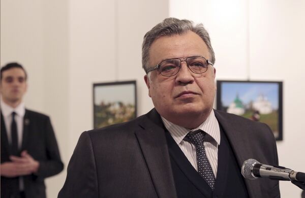 Andrei Karlov, the Russian Ambassador to Turkey, speaks at a photo exhibition in Ankara on Monday, Dec. 19, 2016, moments before a gunman opened fire on him - Sputnik International