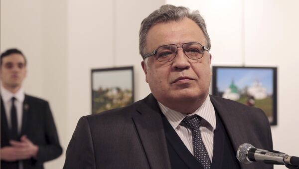 Andrei Karlov, the Russian Ambassador to Turkey, speaks at a photo exhibition in Ankara on Monday, Dec. 19, 2016, moments before a gunman opened fire on him - Sputnik International