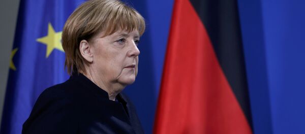 German Chancellor Angela Merkel arrives for a news conference in Berlin, Germany, December 20, 2016, one day after a truck ploughed into a crowded Christmas market in the German capital. - Sputnik International