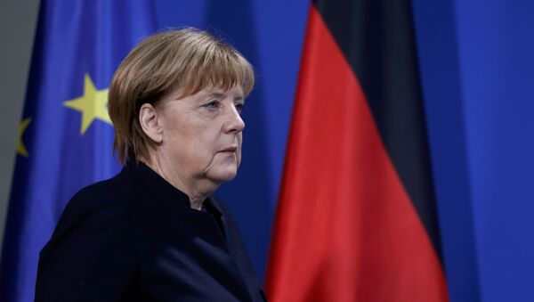 German Chancellor Angela Merkel arrives for a news conference in Berlin, Germany, December 20, 2016, one day after a truck ploughed into a crowded Christmas market in the German capital. - Sputnik International