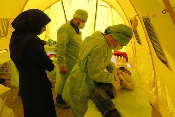 EMERCOM personnel working in Aleppo, Syria EMERCOM personnel working in Aleppo, Syria - Sputnik International