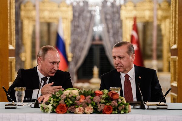 (FILES) This file photo taken on October 10, 2016 shows Russian President Vladimir Putin (L) speaking to Turkish President Recep Tayyip Erdogan (R) as they attend a press conference in Istanbul (FILES) This file photo taken on October 10, 2016 shows Russian President Vladimir Putin (L) speaking to Turkish President Recep Tayyip Erdogan (R) as they attend a press conference in Istanbul - Sputnik International