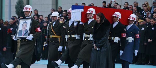 Members of a Turkish forces honour guard carry the Russian flag-draped coffin of Russian Ambassador to Turkey Andrei Karlov who was assassinated Monday, as an officer, left, holds his picture during a ceremony at the airport in Ankara, Turkey, Tuesday, Dec, 20, 2016 Members of a Turkish forces honour guard carry the Russian flag-draped coffin of Russian Ambassador to Turkey Andrei Karlov who was assassinated Monday, as an officer, left, holds his picture during a ceremony at the airport in Ankara, Turkey, Tuesday, Dec, 20, 2016 - Sputnik International