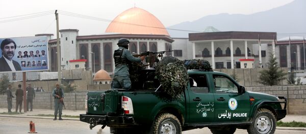 Afghan policemen stand alert in front of the new parliament building after a rocket attack in Kabul, Afghanistan (File) Afghan policemen stand alert in front of the new parliament building after a rocket attack in Kabul, Afghanistan (File) - Sputnik International