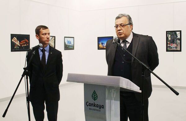 Russian Ambassador Andrei Karlov (right) at the opening of a photo exhibition in the Center of Modern Art in Ankara. (The image is a hand-out material granted by a third party. Editorial use only. Archivation, commercial use or promotional campaign are banned). Photo by ANADOLU/RIA Novosti Russian Ambassador Andrei Karlov (right) at the opening of a photo exhibition in the Center of Modern Art in Ankara. (The image is a hand-out material granted by a third party. Editorial use only. Archivation, commercial use or promotional campaign are banned). Photo by ANADOLU/RIA Novosti - Sputnik International