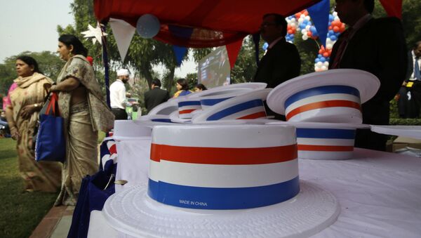 Hats in U.S. national colors made in China are kept for the use of people coming in to watch the counting of votes for the U.S. presidential elections, at the U.S. ambassador's residence, in New Delhi, India, Wednesday, Nov. 9, 2016 - Sputnik International