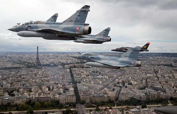 FILE PHOTO - Four Mirage 2000C and one Alpha jet flight over Paris, France, on their way to participate in the Bastille Day military parade, July 14 2016 - Sputnik International