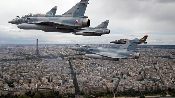 FILE PHOTO - Four Mirage 2000C and one Alpha jet flight over Paris, France, on their way to participate in the Bastille Day military parade, July 14 2016 - Sputnik International