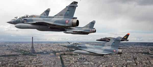 FILE PHOTO - Four Mirage 2000C and one Alpha jet flight over Paris, France, on their way to participate in the Bastille Day military parade, July 14 2016 - Sputnik International