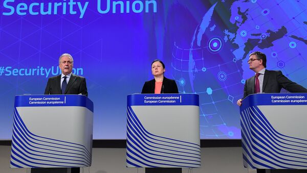 (L-R) European Commissioner for Migration, Home Affairs and Citizenship Dimitris Avramopoulos, European Commissioner for Justice, Consumers and Gender Equality Vera Jourova and European Commissioner for Security Union Julian King at the European Commission in Brussels, on December 21, 2016. - Sputnik International