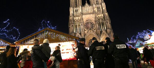 French police officers patrol at the Christmas market next to the Cathedral of Notre-Dame de Reims. File photo French police officers patrol at the Christmas market next to the Cathedral of Notre-Dame de Reims. File photo - Sputnik International