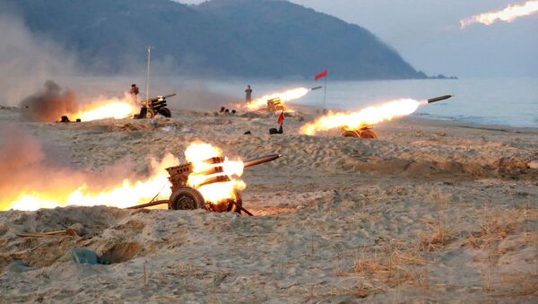 A view of a firing contest among multiple launch rocket system (MLRS) batteries selected from large combined units of the KPA, in this undated photo released by North Korea's Korean Central News Agency (KCNA) in Pyongyang - Sputnik International