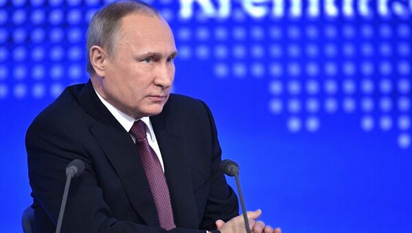 Russian President Vladimir Putin attends his annual end-of-year news conference in Moscow, Russia - Sputnik International