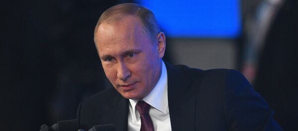 Russian President Vladimir Putin attends his annual end-of-year news conference in Moscow, Russia - Sputnik International