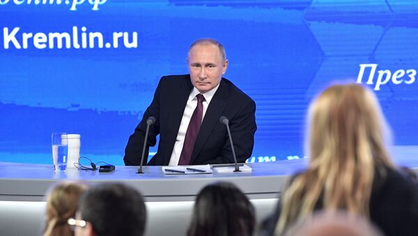 Russian President Vladimir Putin during his 12th annual news conference at Moscow's World Trade Center in Krasnaya Presnya - Sputnik International
