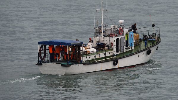 A rescue operation on the Black Sea coast at the crash site of Russian Defense Ministry's TU-154 aircraft - Sputnik International