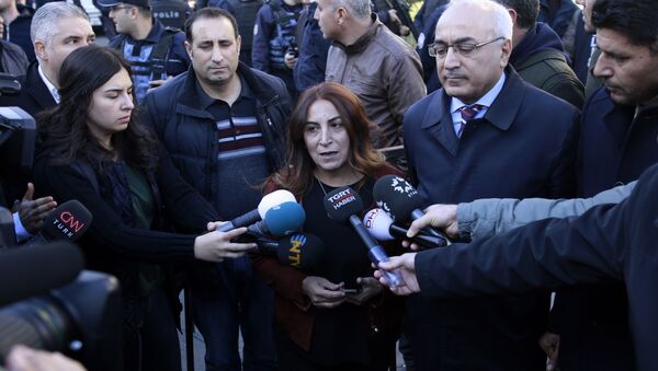 Aysel Tugluk, a pro-Kurdish politician, speaks to the media during a protest against the detention of pro-Kurdish Peoples' Democratic Party, or HDP, lawmakers, in Ankara, Turkey, Friday, Nov. 4, 2016 - Sputnik International